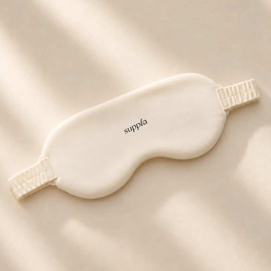 Beige sleep mask with 'suppla' branding on a beige background